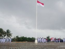 Meski Diguyur Hujan, Paskibraka Butur Sukses Kibarkan Bendera Merah Putih